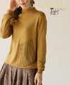 Patchwork accents in mustard color top 