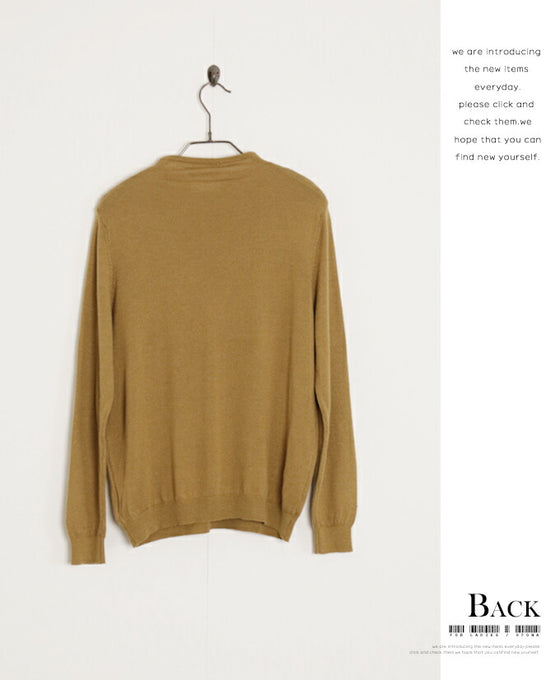 Patchwork accents in mustard color top