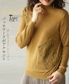 Patchwork accents in mustard color top 