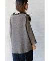 A cute knit made of different materials that you can wear every day in grey