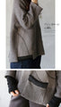 A cute knit made of different materials that you can wear every day in grey