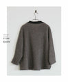A cute knit made of different materials that you can wear every day in grey