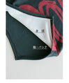 Wrapped in a cozy knit, this top features an eye-catching artistic pattern all around. 