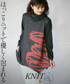 Wrapped in a cozy knit, this top features an eye-catching artistic pattern all around. 