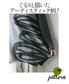 Wrapped in a cozy knit, this top features an eye-catching artistic pattern all around (gray)