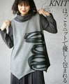 Wrapped in a cozy knit, this top features an eye-catching artistic pattern all around (gray)