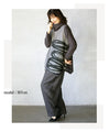 Wrapped in a cozy knit, this top features an eye-catching artistic pattern all around (gray)