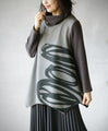 Wrapped in a cozy knit, this top features an eye-catching artistic pattern all around (gray)