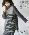 Wrapped in a cozy knit, this top features an eye-catching artistic pattern all around (gray)