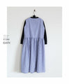 A refreshing breeze blows. A one-piece dress made from different materials