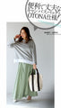 A mature, vertically long canvas bag