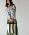 A mature, vertically long canvas bag
