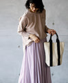 A mature, vertically long canvas bag