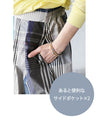 A voluminous tuck skirt with a striking large check pattern