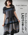 A pleated dress for a ladylike look