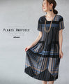 A pleated dress for a ladylike look