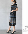 A pleated dress for a ladylike look