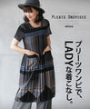 A pleated dress for a ladylike look