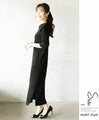 A modern, beautiful knit dress with a large collar in black