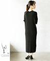 A modern, beautiful knit dress with a large collar in black