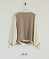 A trendy sheer sleeve striped top