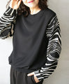 Elegant and relaxed, adult animal style is here. Pleated sleeve top in different materials.