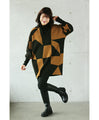 An artistic knit top that looks stylish on its own