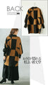 An artistic knit top that looks stylish on its own