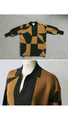 An artistic knit top that looks stylish on its own