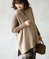 I love this step-up oversized knit vest