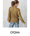 A bottle neck top with a wavy fabric that will make you fall in love at first sight