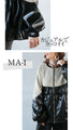 A casual, modern blouson made from different materials