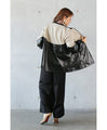 A casual, modern blouson made from different materials