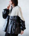 A casual, modern blouson made from different materials
