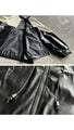 A casual, modern blouson made from different materials