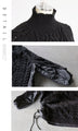 If you're unsure of how to combine different materials to keep you warm, try this versatile black top