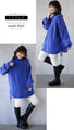 A warm combination of different materials. Royal blue stands out against the cold sky.