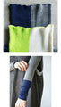 A pullover top with a colorful accent that can be worn as the main piece or layered.