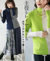 A pullover top with a colorful accent that can be worn as the main piece or layered.
