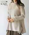 Simple and unique sophisticated design. Mixed material knit turtleneck top 
