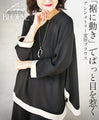 A modified blouse with a flowing hem that catches your eye