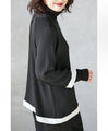 A modified blouse with a flowing hem that catches your eye
