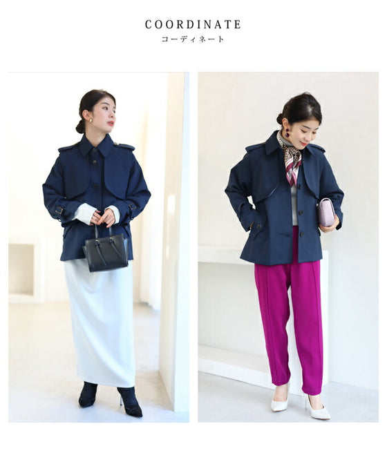 上品なネイビーカラーのトレンチショートコート