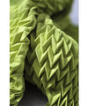 A loose, bouncy zigzag pleated pullover top
