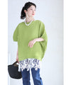 A loose, bouncy zigzag pleated pullover top