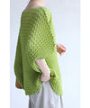 A loose, bouncy zigzag pleated pullover top