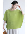 A loose, bouncy zigzag pleated pullover top