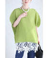 A loose, bouncy zigzag pleated pullover top