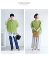A loose, bouncy zigzag pleated pullover top