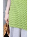 A loose, bouncy zigzag pleated pullover top